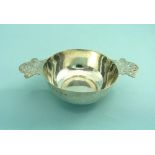 A George V silver Quaich, hallmarked Sheffield, 1925, of traditional form with pierced scroll