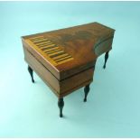 An early 19thC French Palais Royal style mahogany Musical Sewing Box, in the form of a grand