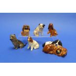 A Royal Doulton Cocker Spaniels Sleeping group, HN 2590, 4¼in (11cm) wide, together with five