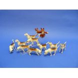 Ten Beswick pottery Foxhounds, comprising MN.941 (1), MN.942 (1), MN.943 (1), MN.944 (1), MN.2262 (