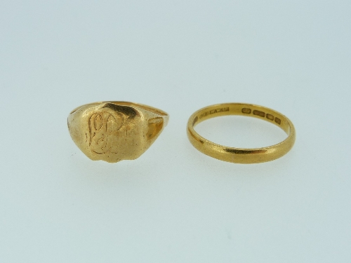 A 22ct yellow gold Wedding Band, 3.3g, together with an 18ct yellow gold signet ring, 3.1g (2)
