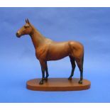 A Beswick pottery "Arkle Champion Steeplechaser" model, MN.2065, matt, on oval wooden base,