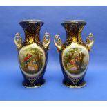 A pair of large Continental porcelain Vases, early 20thC, cobalt blue ground with scroll handles,