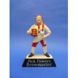 A Carlton Ware Pick Flowers Brewmaster Beer advertising figure, 9½in (24cm) high.