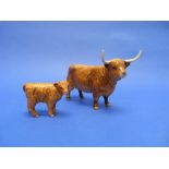 A Beswick pottery Highland Cow, MN.1740, gloss, 5?in (13cm) high, together with a Beswick pottery