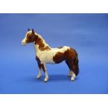 A Beswick pottery Pinto Pony, MN.1373, first version, skewbald, gloss, 6½in (16.5cm) high.