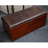 A Starbay ottoman with brown leather top, opening to reveal storage space and two heavy gauge