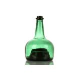 A NOVELTY GREEN GLASS MUSICAL ONION WINE BOTTLE, early 20th century, moulded in 18th century