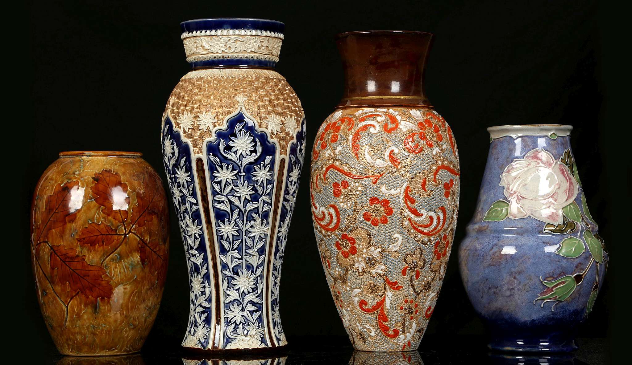 FOUR INTERESTING DOULTON VASES, early 20th century, comprising a Royal Doulton 'Natural Foliage