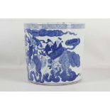 A Chinese blue and white large brush pot, decorated all round with immortals riding exotic