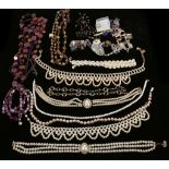An interesting collection of costume jewellery to include, simulated pearls, necklaces, pendants,