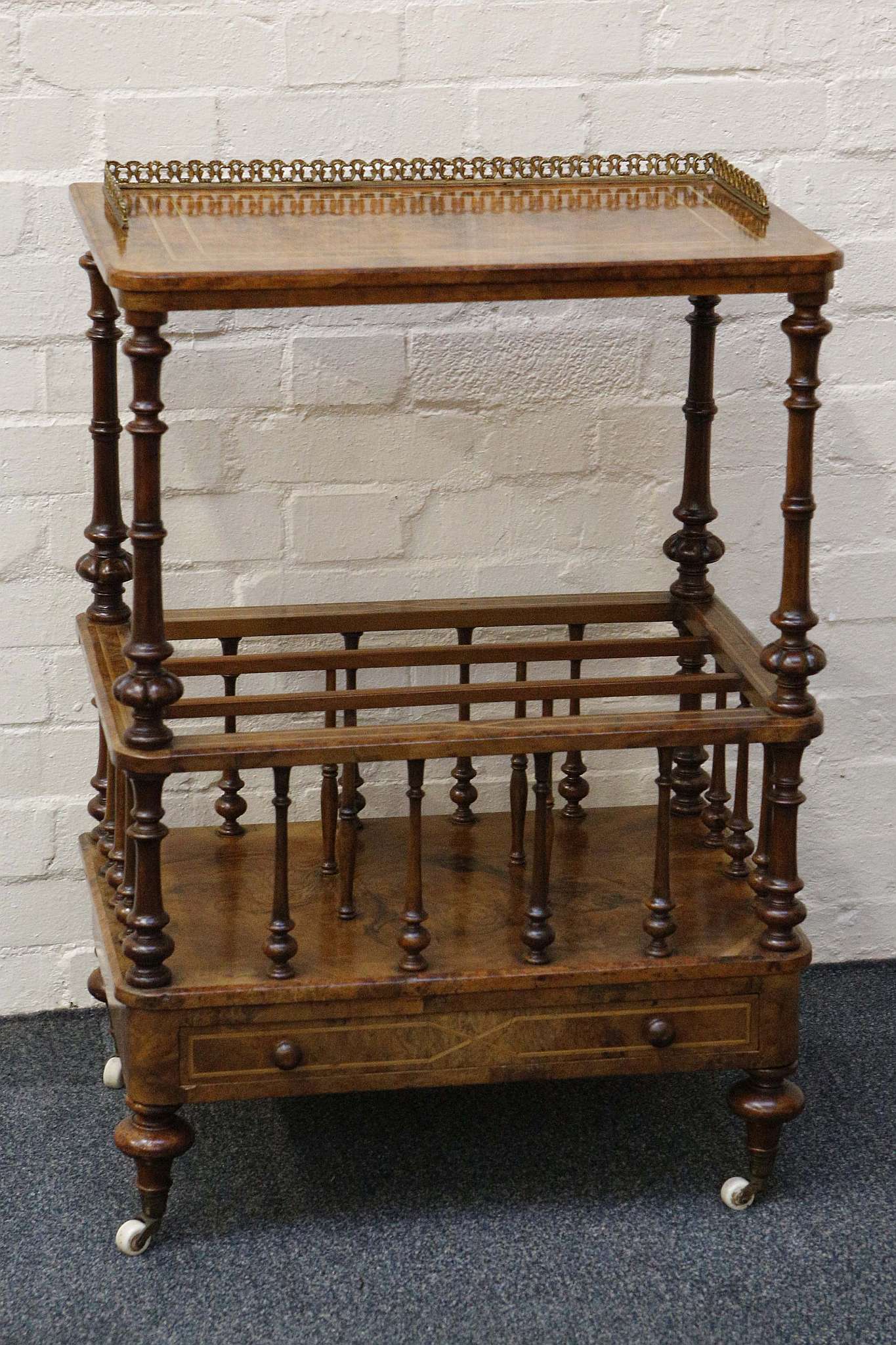 A mid 19th century Canterbury, burr walnut with boxwood inlay, brass gallery, turned supports