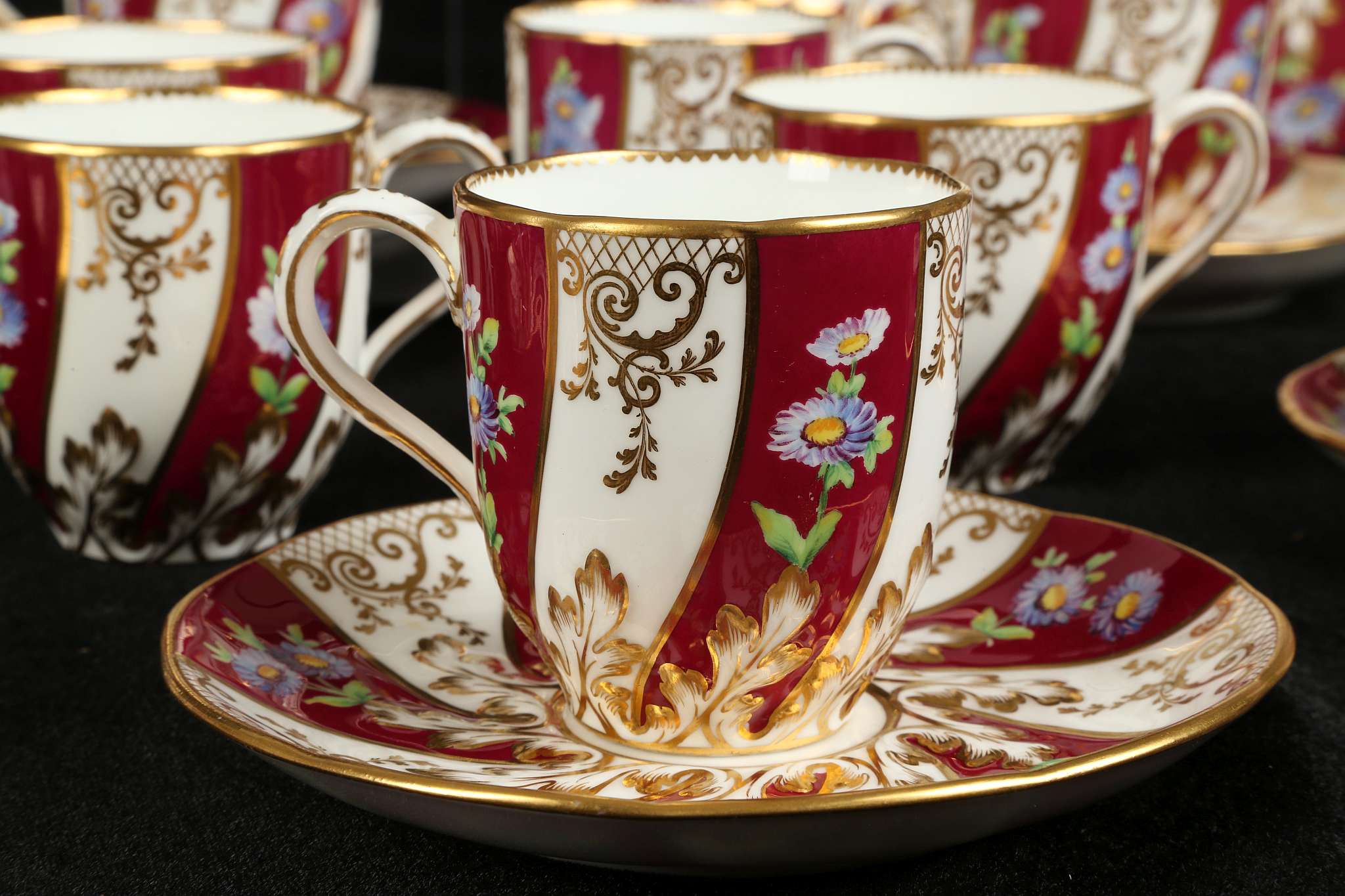 AN ENGLISH PORCELAIN TEA AND COFFEE SERVICE, mid 19th century, decorated with flowers on a crimson - Image 3 of 6