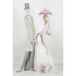 A large Lladro porcelain model of a courting couple in 19th century costume, with their dog, 49.