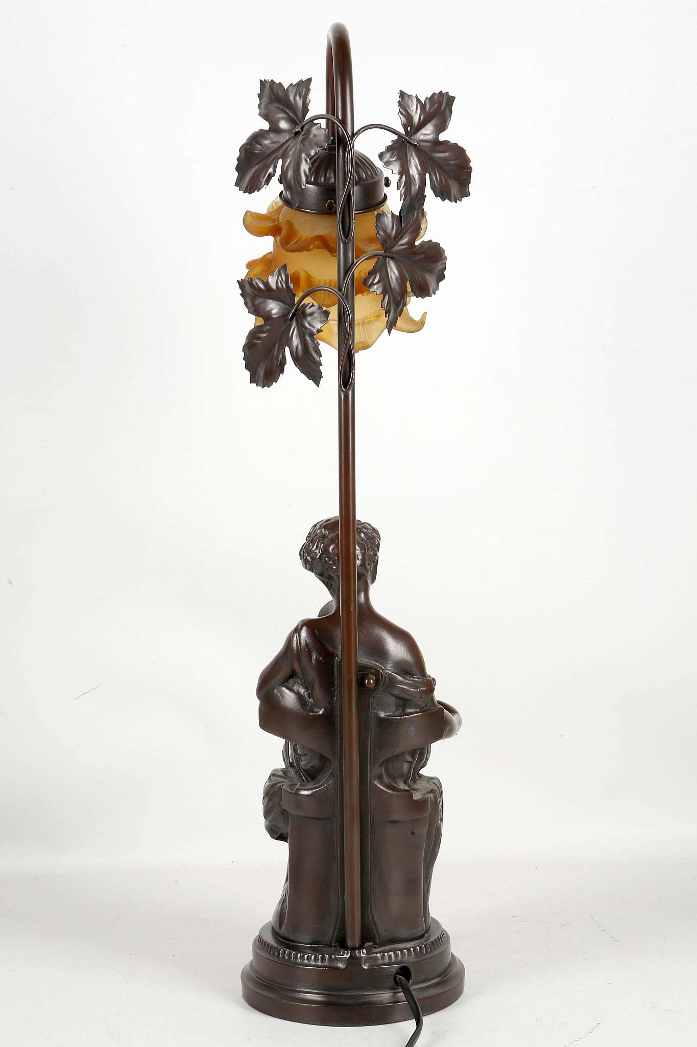 A bronzed Deco style figural table lamp with classical maiden seated with book, satin amber glass - Image 2 of 2