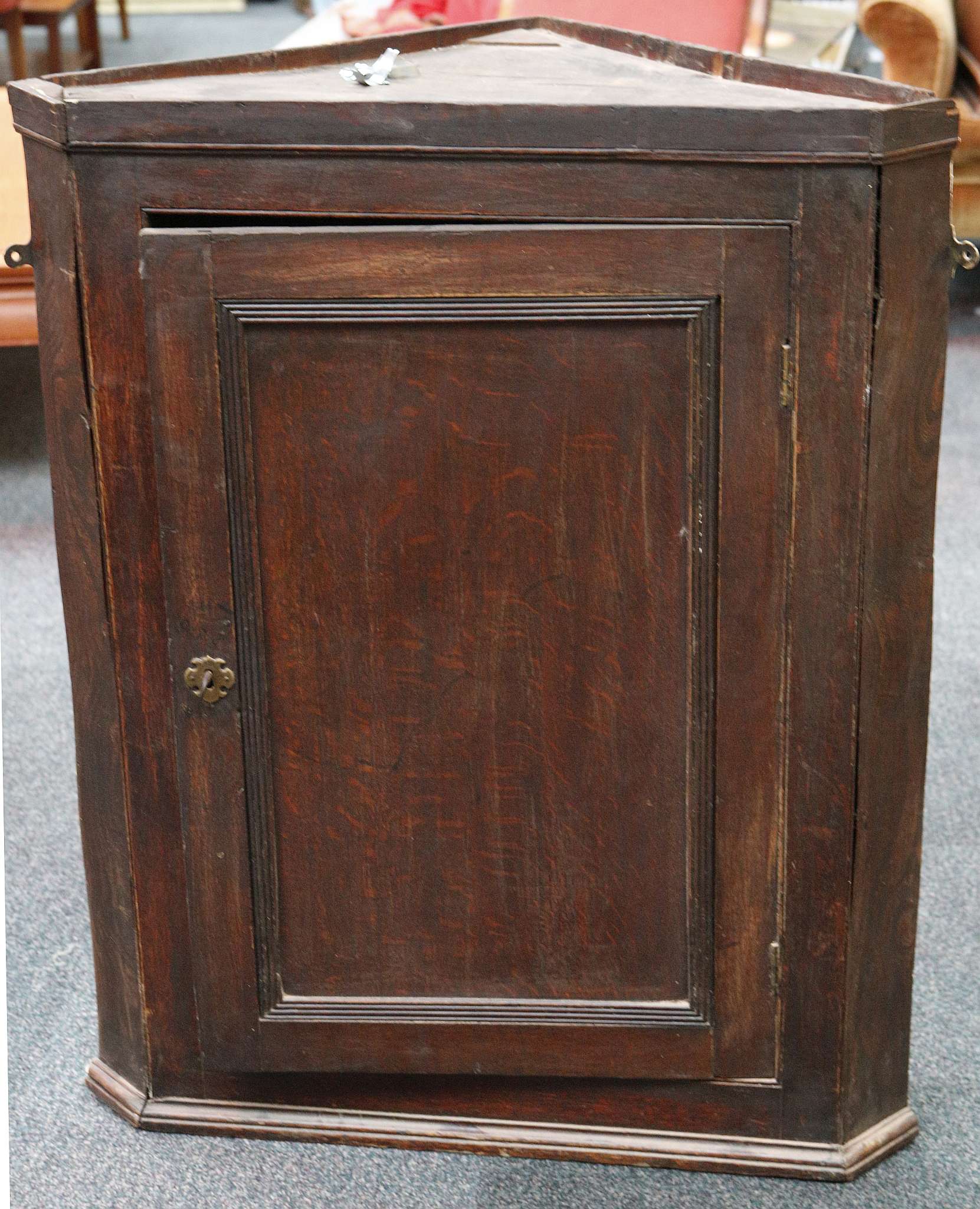 A Georgian style oak hanging corner wall cupboard, 80 x 39 x 109cm high