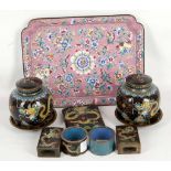 A Persian rectangular pink enamel tray, decorated with butterflies amongst foliage, together with