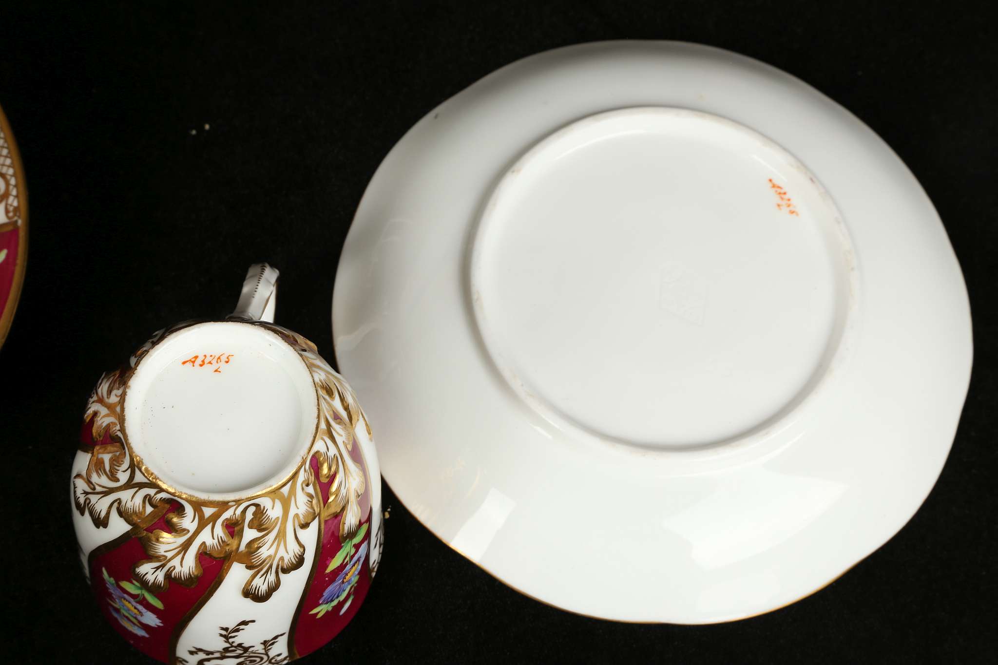 AN ENGLISH PORCELAIN TEA AND COFFEE SERVICE, mid 19th century, decorated with flowers on a crimson - Image 6 of 6