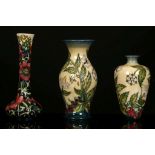 THREE CONTEMPORARY MOORCROFT VASES, comprising two baluster vases decorated in the 'Fruit Garden'