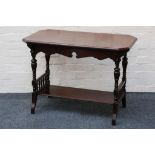 A late 19th century side table, mahogany, cut corner top, shaped apron, turned supports,