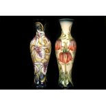 TWO LIMITED EDITION MOORCROFT POTTERY VASES, both of baluster form, one decorated in the '