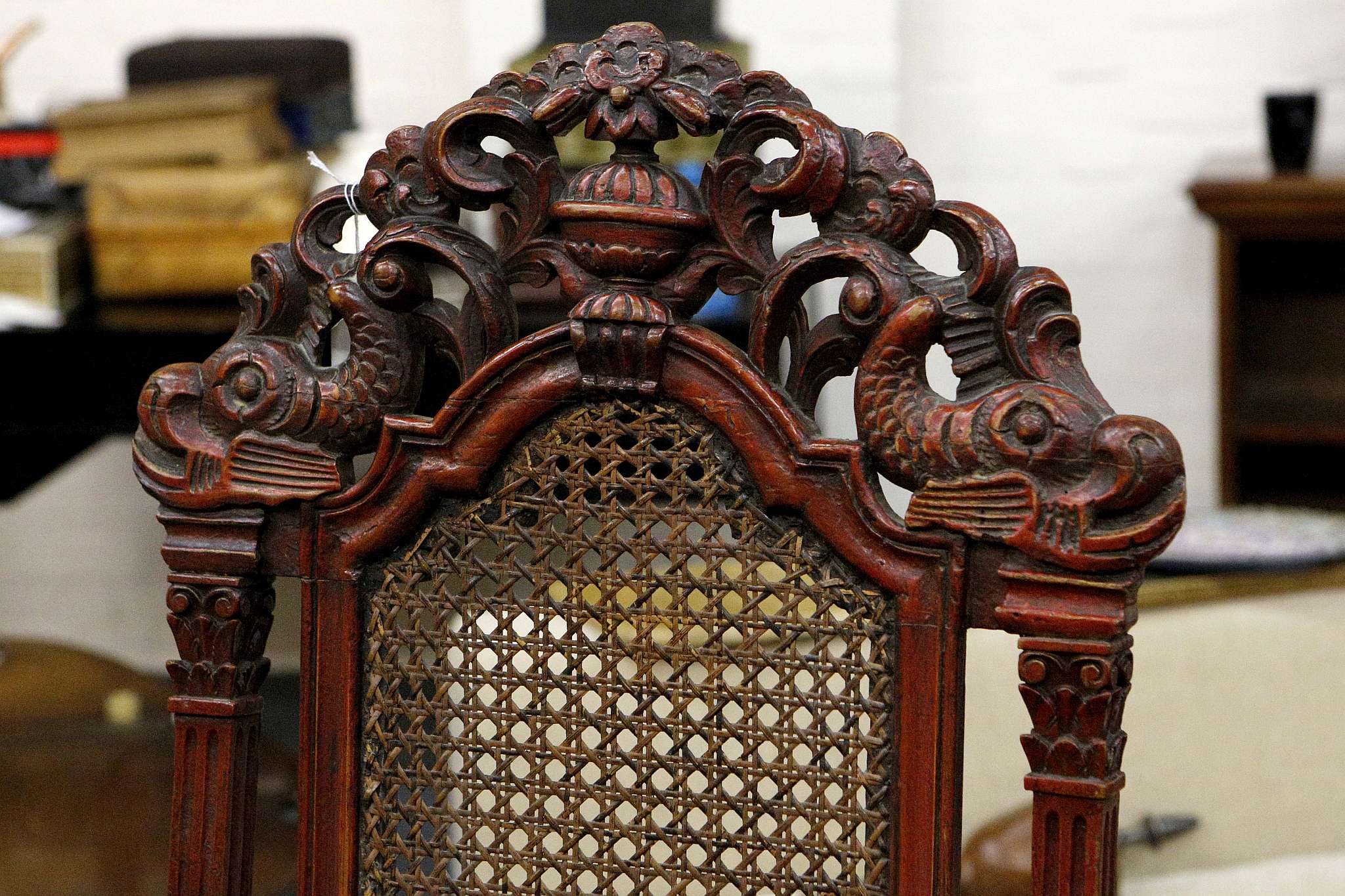 A mid 19th century elbow chair, carolean design, red finish, dolphin, urn and floral carved - Image 3 of 4