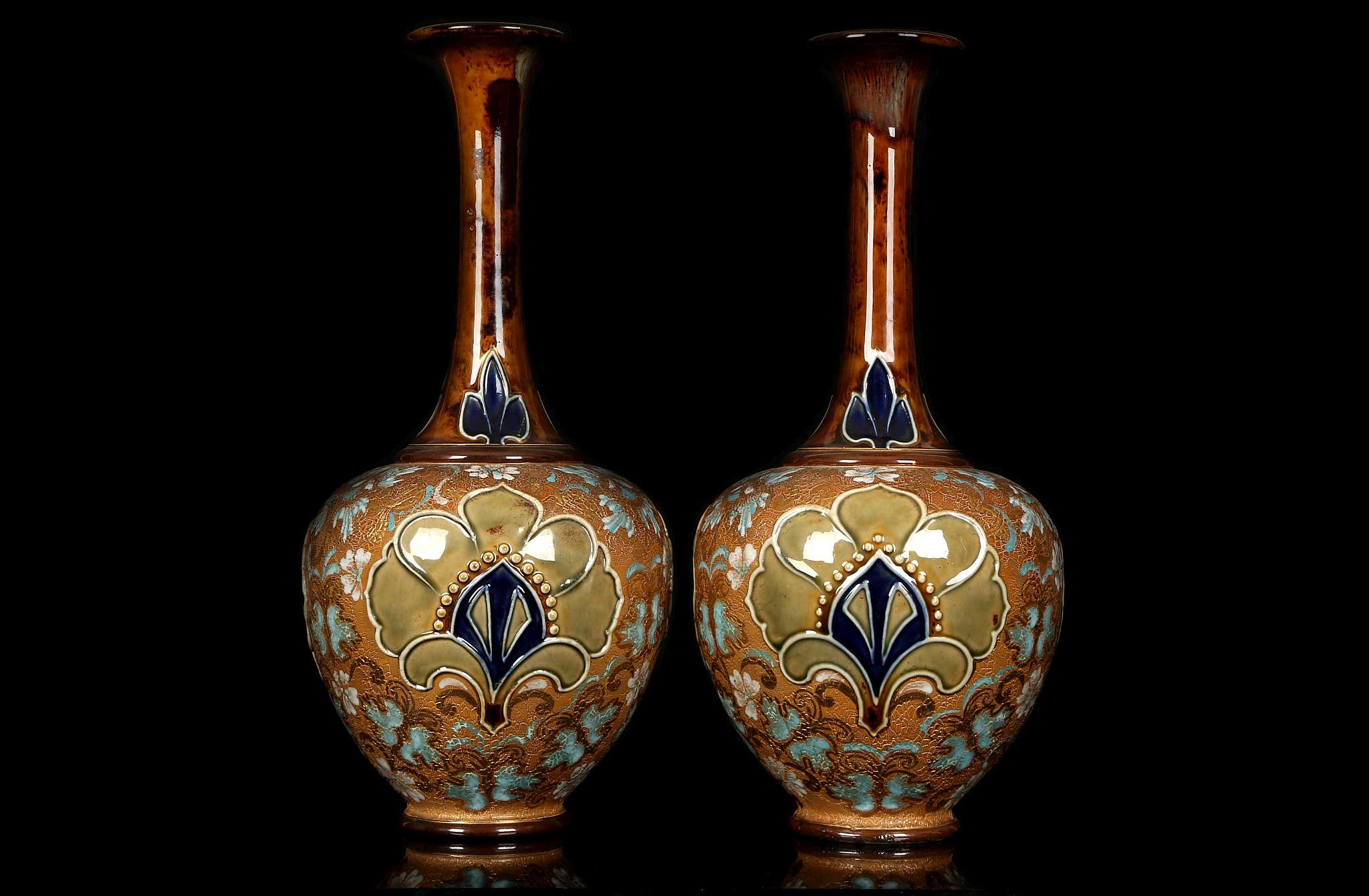 JANE HURST FOR ROYAL DOULTON, circa 1920, a large pair of Slater's Patent stoneware bottle vases,