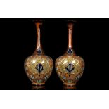 JANE HURST FOR ROYAL DOULTON, circa 1920, a large pair of Slater's Patent stoneware bottle vases,