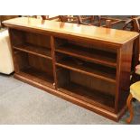 A mahogany bookcase of low form, open adjustable shelving, turn of the century. 88.5 x 183 x 36cm.