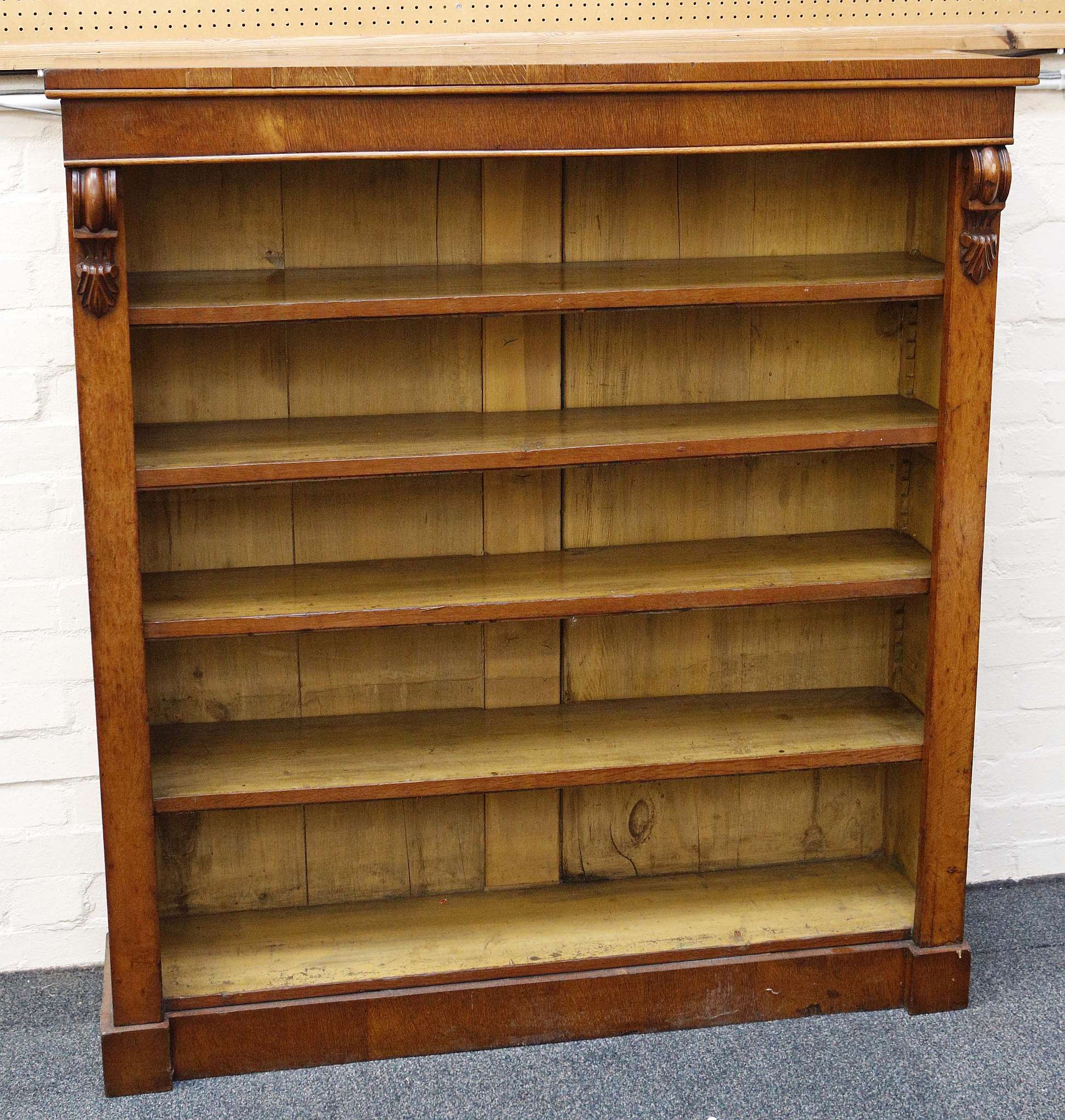 Early 20th century open book shelves, light mahogany, applied scroll mounts, adjustable shelves.