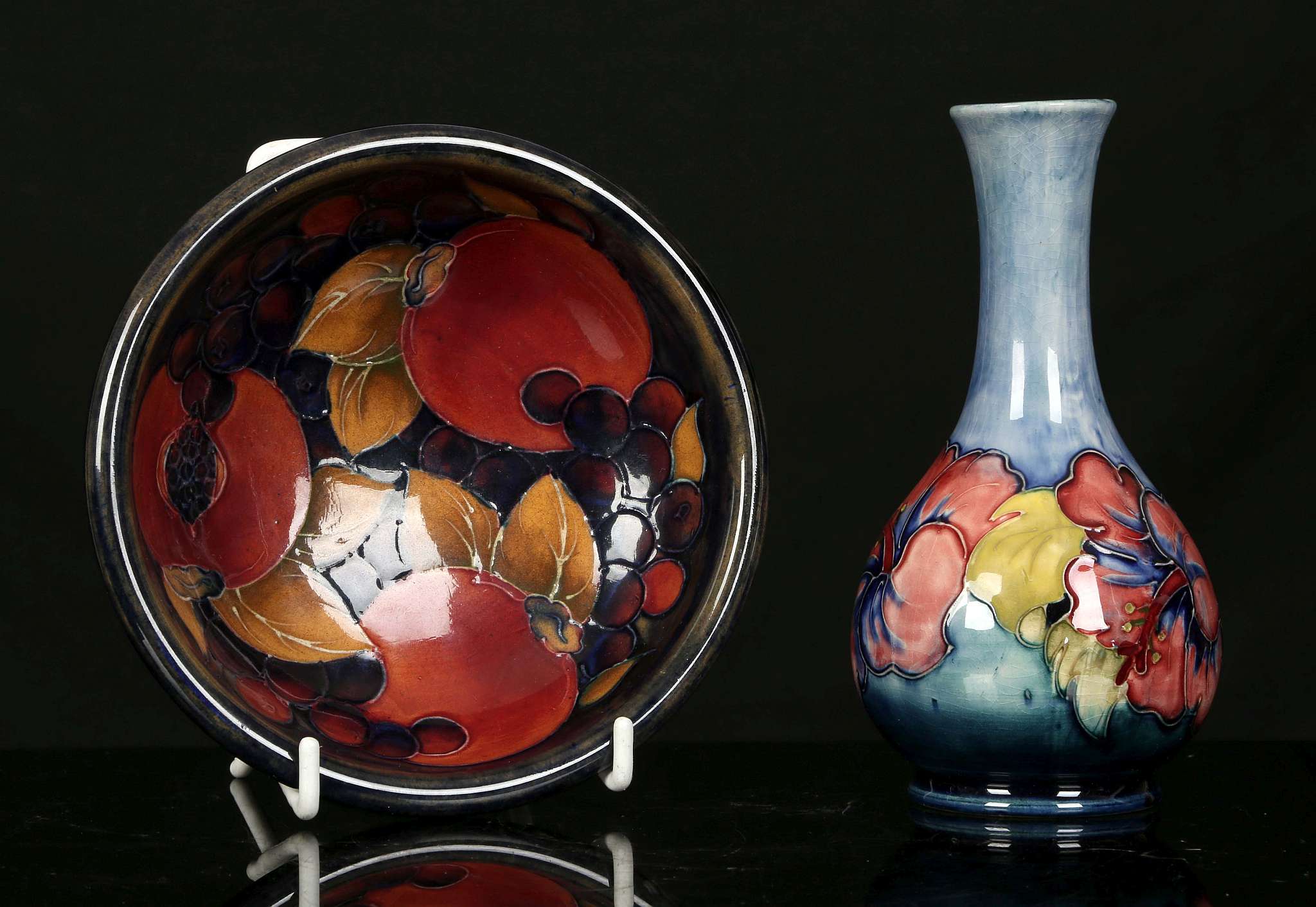 A WALTER MOORCROFT 'POMEGRANATE' DISH AND A BOTTLE VASE, mid 20th century, the dish decorated with - Image 2 of 5