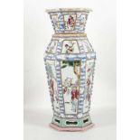 A Chinese Qing / early Republic period hexagonal sectioned famille rose vase with figurative and