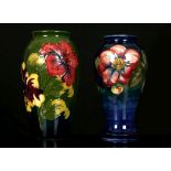 TWO WALTER MOORCROFT POTTERY VASES, mid 20th century, comprising an ovoid vase decorated in the '