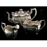 A George IV Irish silver, three piece silver tea set of rectangular section, with bright cut