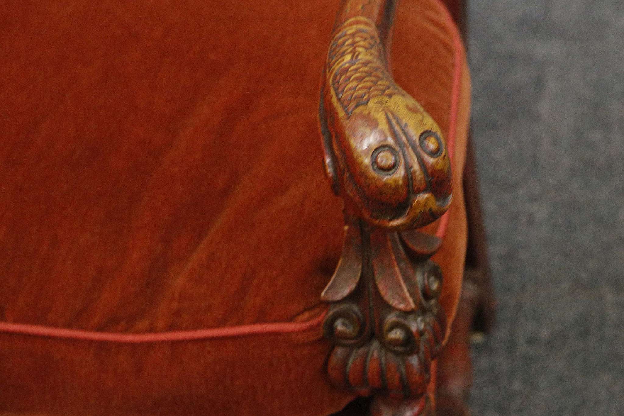 A mid 19th century elbow chair, carolean design, red finish, dolphin, urn and floral carved - Image 2 of 4