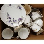 Three English porcelain floral tea services, early 20th century, each decorated with sprays of