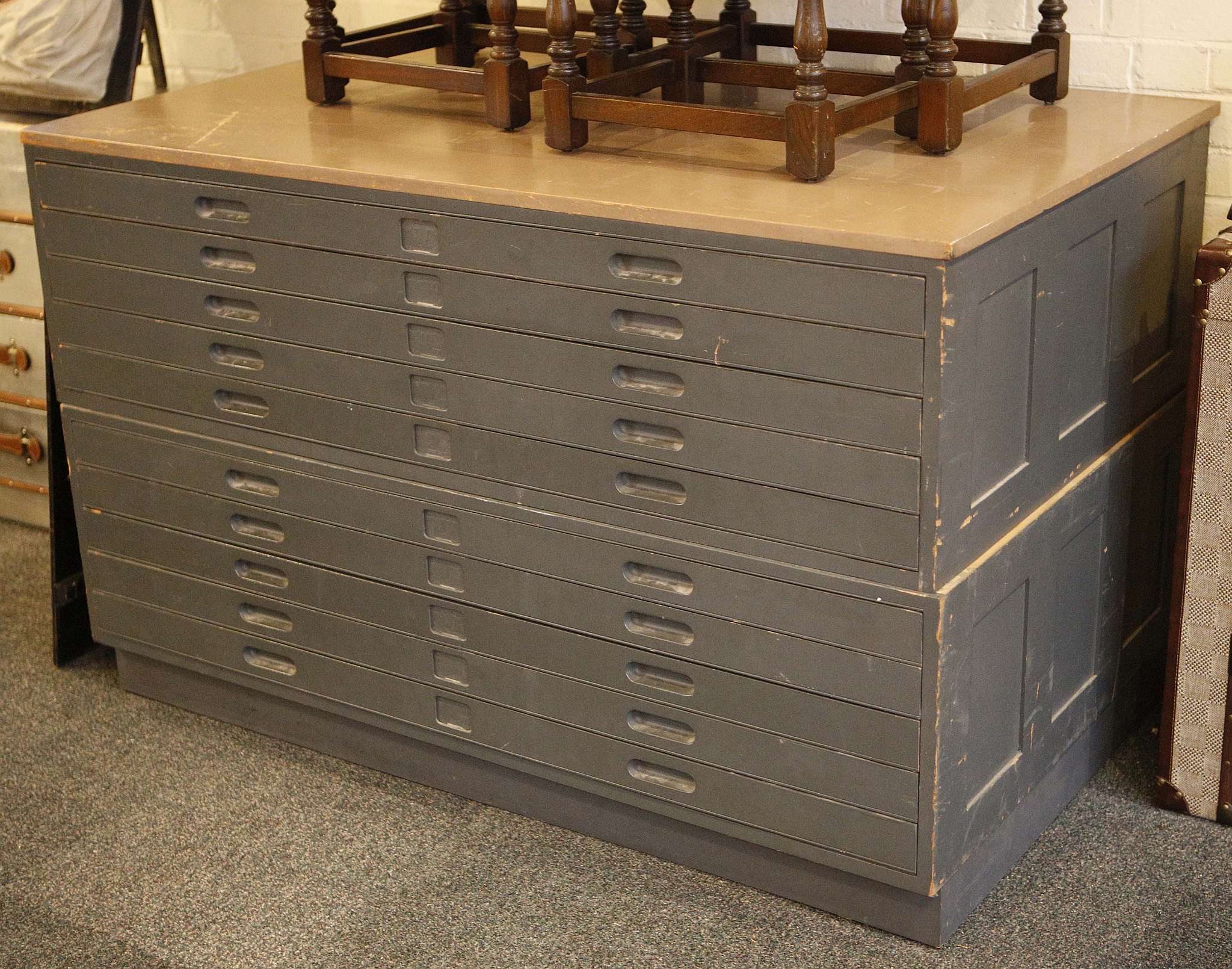 A 10 drawer painted plan chest, in two sections, raised on plinth base, 147 w x 89 d x 92cm high