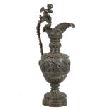 A 19th century continental, renaissance style, bronze 'neo-classical' ewer, casted on a border