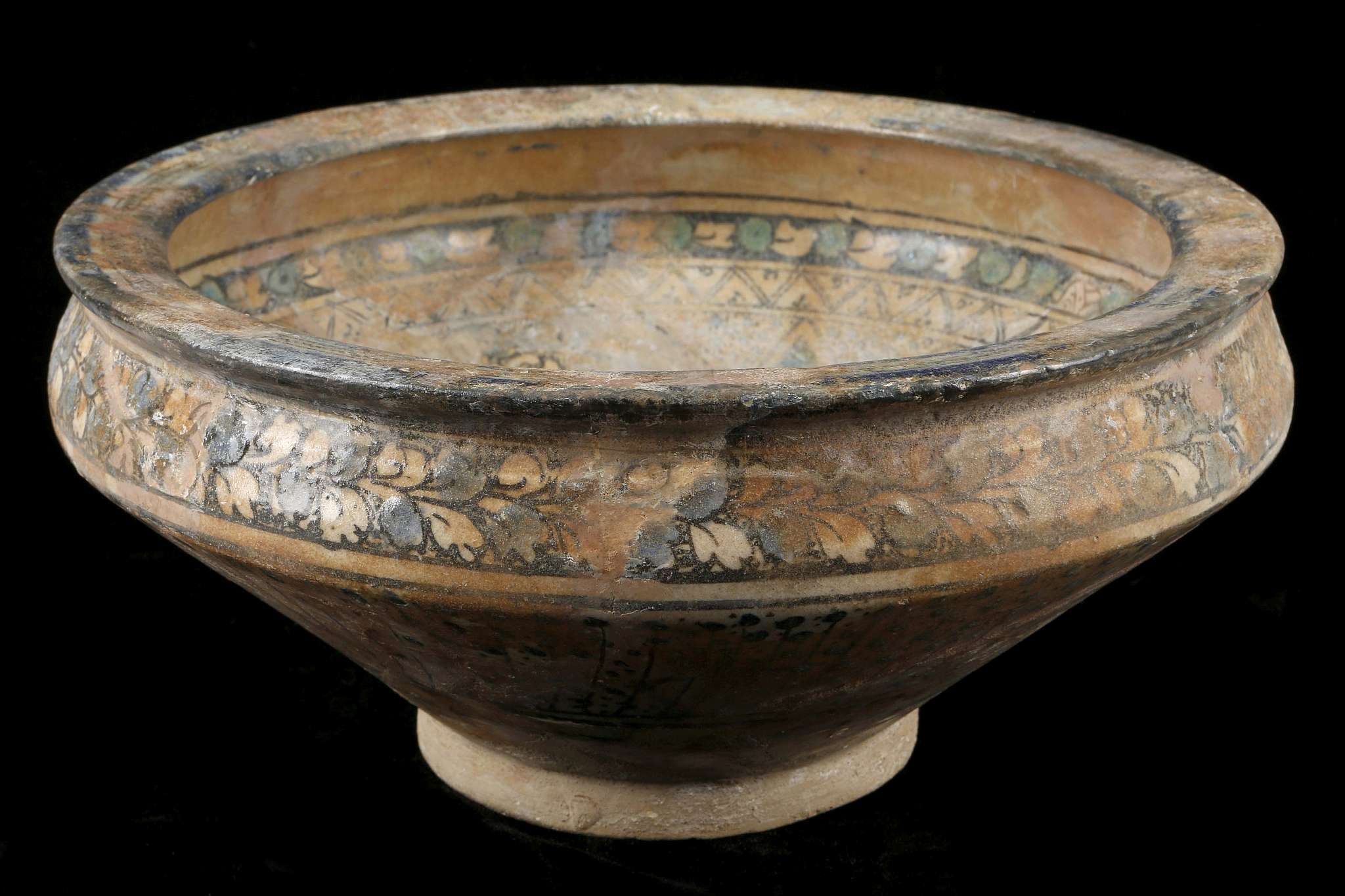 A LARGE KASHAN POTTERY BOWL, 13th or early 14th century, Central Iran, of conical form with a flat