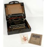 A rare Corona reporter's typewriter, c.1920's, retailed by Gerrard of New Bond Street, fitted in a