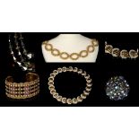 1980s COSTUME JEWELLERY, to include a gilt metal belt, each loop signed 'M', a gilt metal and