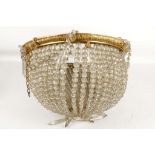A French, late Empire, basket chandelier, floral band and finials, crystal multi faceted swags and