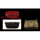 THREE PETITE DESIGNER HANDBAGS, to include a black fabric Gucci bag, a red suede Sergio Rossi bag,