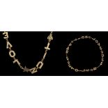 YVES SAINT LAURENT NECKLACE AND BRACELET SET, gilt metal set with diamanté spelling out 'Soir', '