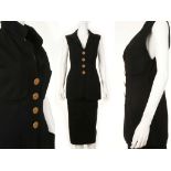 CHANEL BOUTIQUE BLACK WOOL ENSEMBLE, 1990s, comprising a sleeveless jacket with gilt faux buttons to