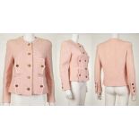 CHANEL BOUTIQUE BOUCLE JACKET, pale pink wool with open gilt double C buttons, unusual sideways