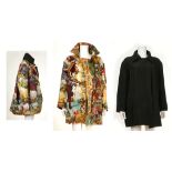 HERMES REVERSIBLE COAT, 'Columbus' printed silk to one side, plain black with two pockets to the