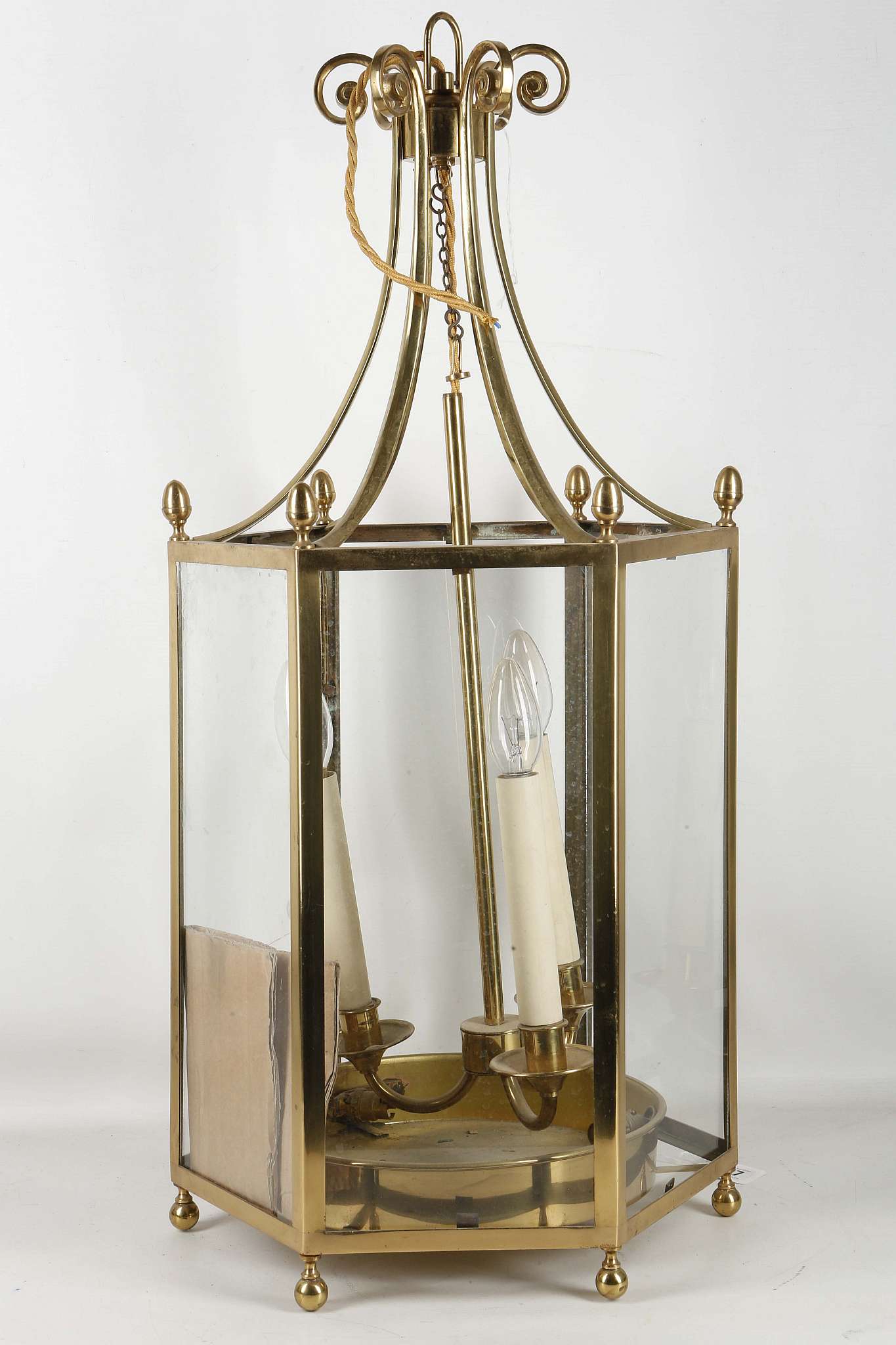A mid 20th century octagonal brass and glass hanging lantern, originally hung in a Chelsea manor