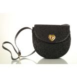 YVES SAINT LAURENT CROSSBODY BAG, 1980s, black fabric with arabesque design, gilt metal heart