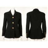 CHANEL BOUTIQUE BOUCLE JACKET, black wool with gilt buttons, silk lined with weighted gilt chain